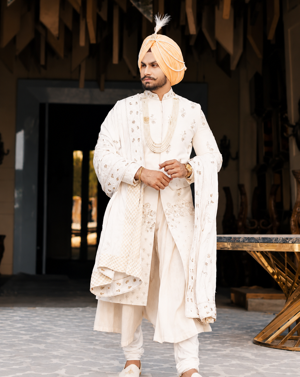 Regal Ivory Sherwani with Pearl Elegance for the Punjabi Groom