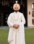 Regal Ivory Sherwani with Pearl Elegance for the Punjabi Groom