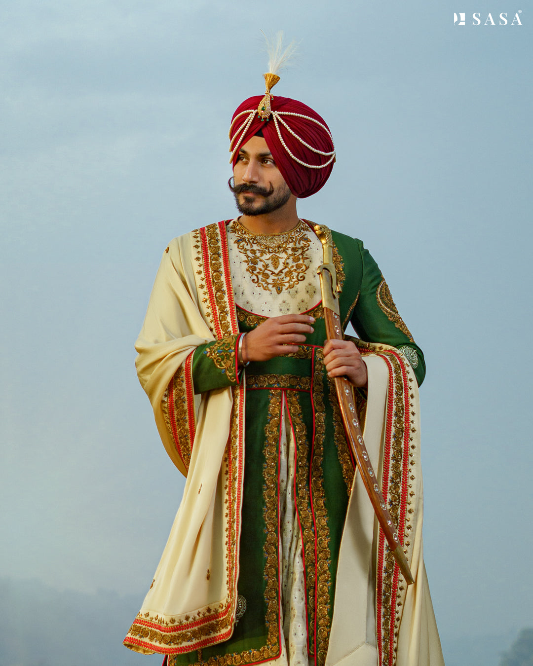 Exquisite Dark Green Sherwani Set with Handcrafted Golden & Red Details