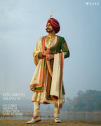 Exquisite Dark Green Sherwani Set with Handcrafted Golden & Red Details