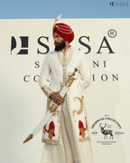 Elegant Off-White Sherwani Complemented by Rich Red Palla