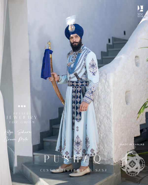 Elegant Sky Blue Poshak with Navy Patchwork & Satin Palla