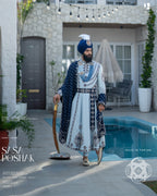 Elegant Sky Blue Poshak with Navy Patchwork & Satin Palla
