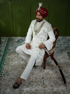 White Sherwani with Intricate Green Embroidery