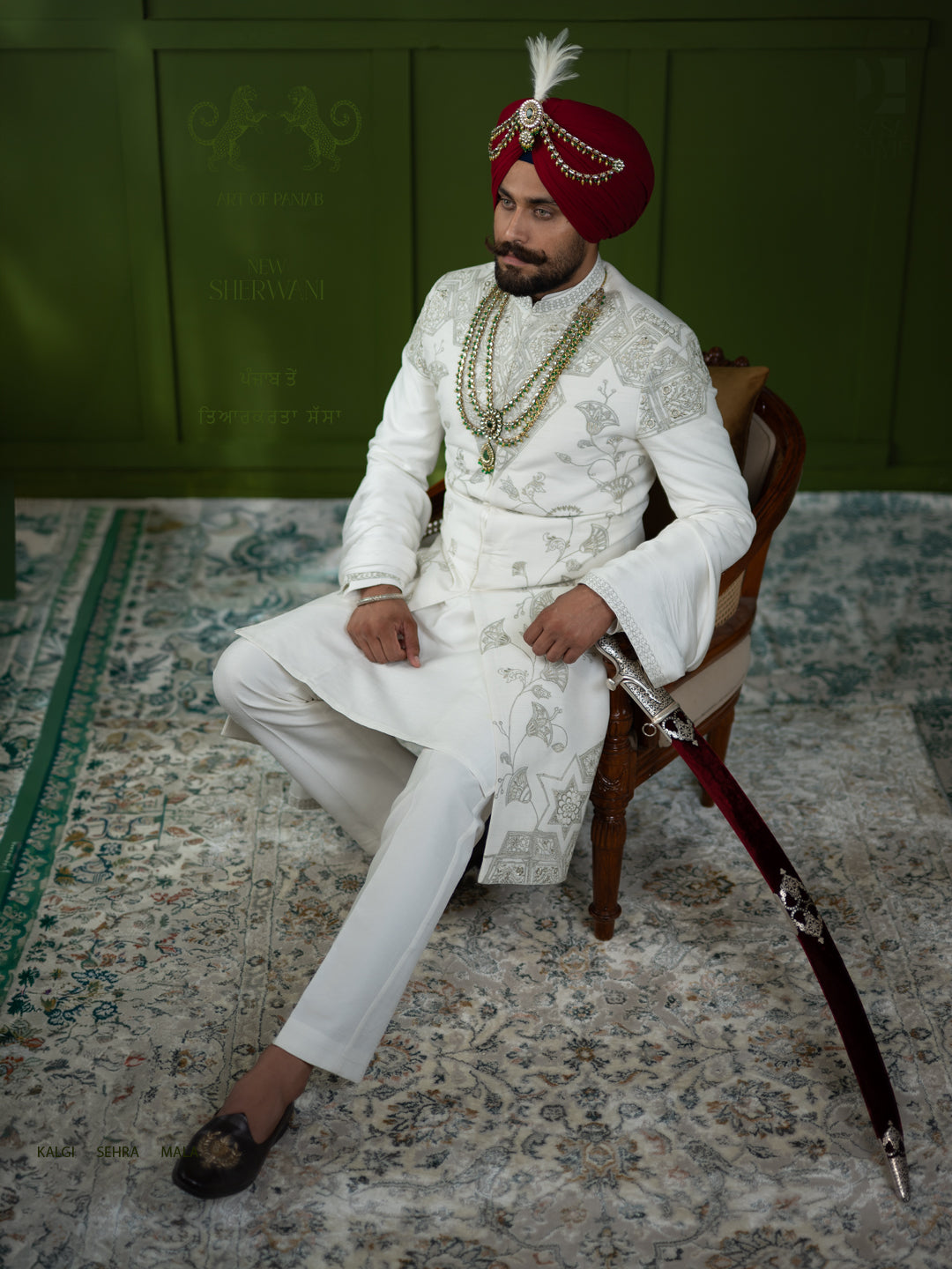 White Sherwani with Intricate Green Embroidery