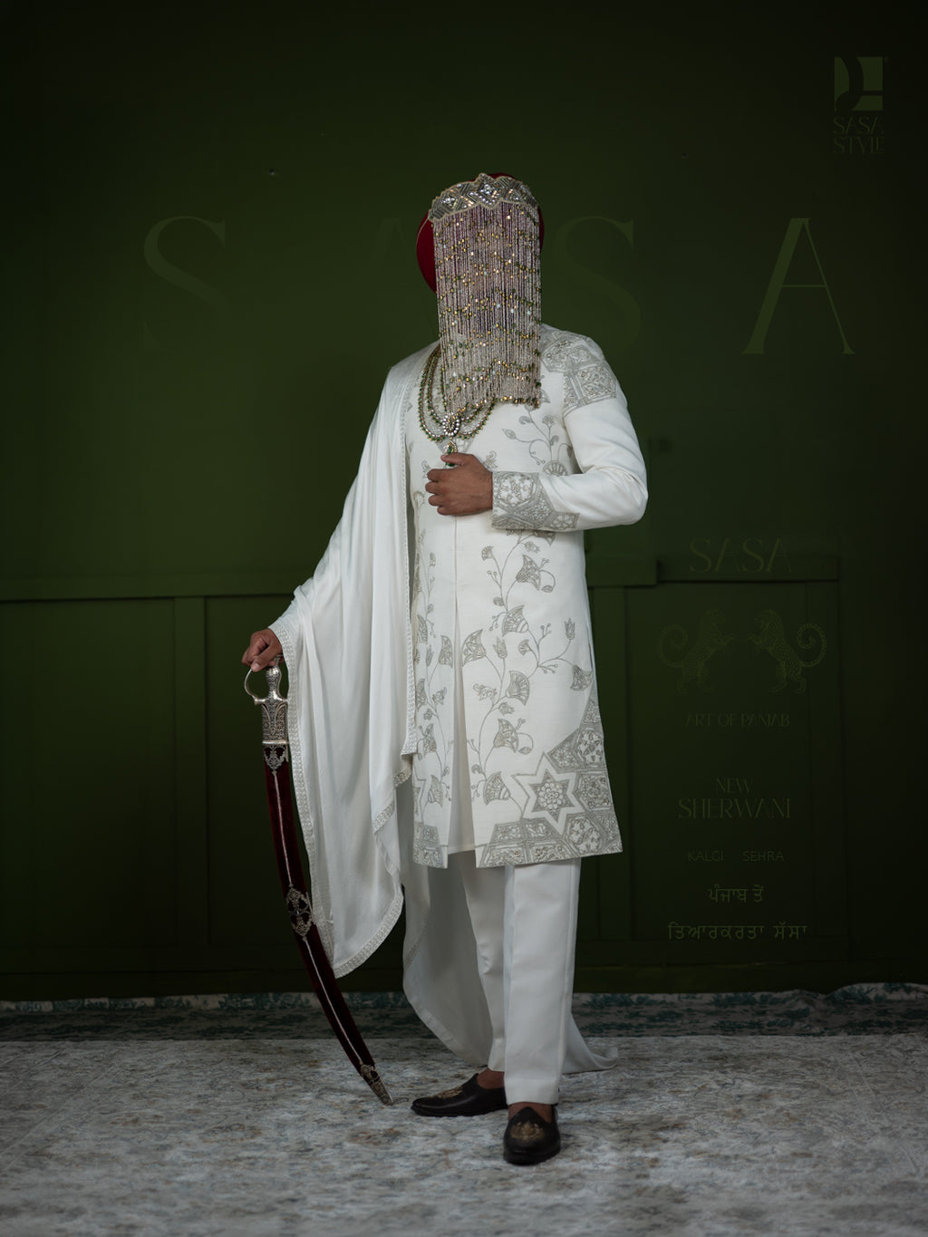 White Sherwani with Intricate Green Embroidery