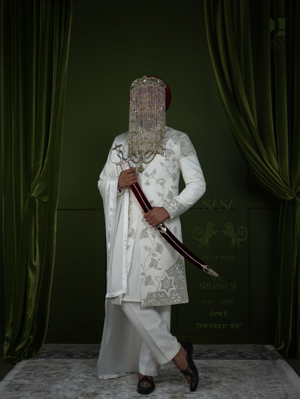 White Sherwani with Intricate Green Embroidery