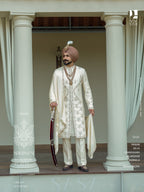 Ivory Handcrafted Sherwani with Regal Embroidery for the Modern Groom