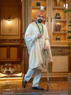 Elegant Cream Sherwani with Delicate Badla Work
