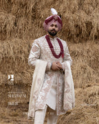 Off-White Royal Sherwani with Traditional Sehra and Red Accents