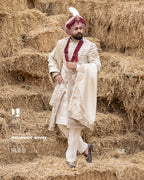 Off-White Royal Sherwani with Traditional Sehra and Red Accents