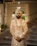 Magnificent Cream Sherwani with Gold-Copper Embroidery & Royal Turban
