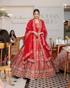 Traditional Red Bridal Lehenga with Intricate Hand Embellishments