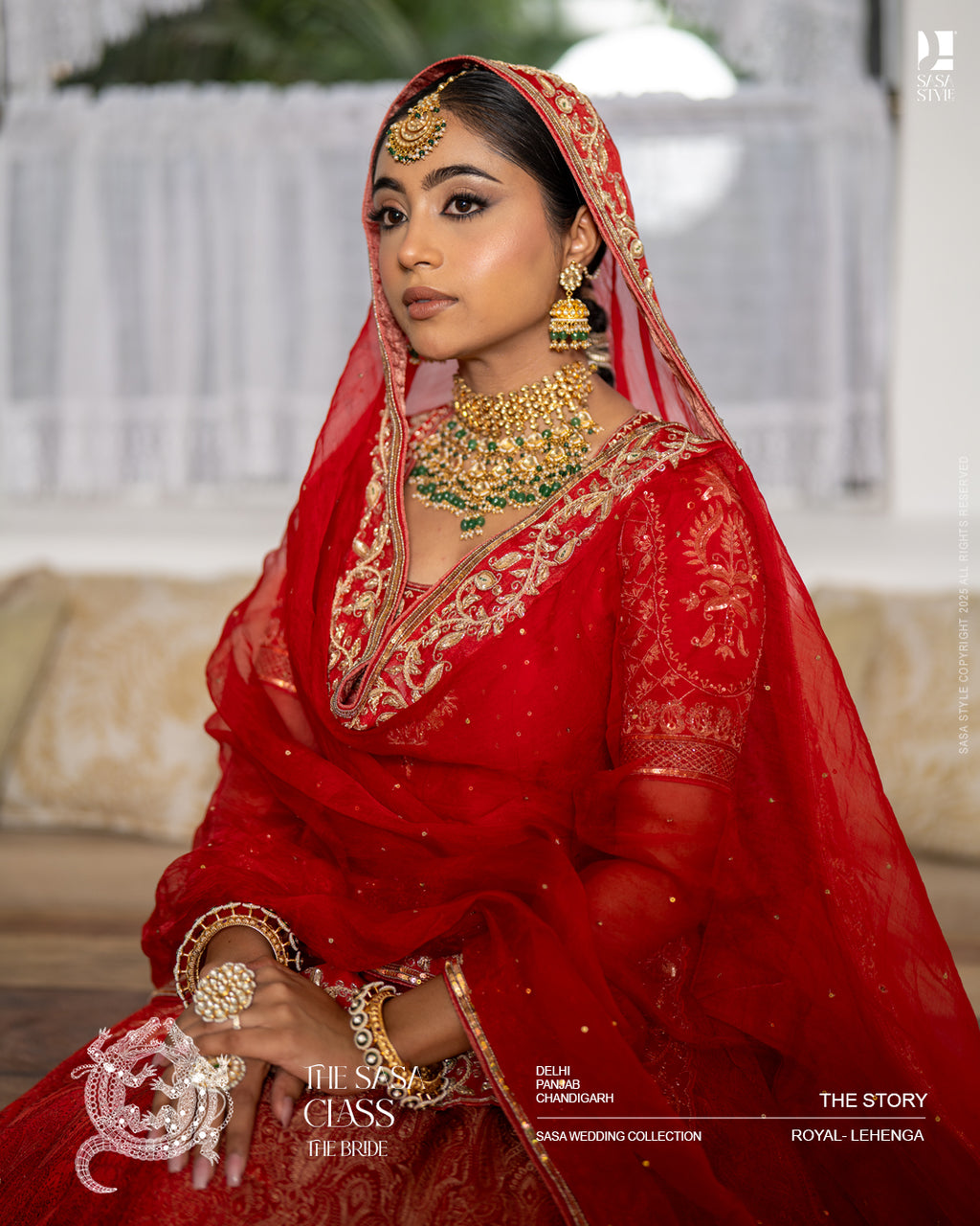 Red bridal lehenga with intricate handwork and traditional dupatta
