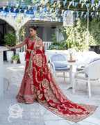 Red bridal lehenga with intricate handwork and traditional dupatta