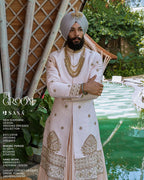 Pastel Peach Sherwani Angrakha Set with Regal Wedding Elegance