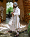 Pastel Peach Sherwani Angrakha Set with Regal Wedding Elegance
