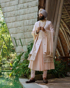 Pastel Peach Sherwani Angrakha Set with Regal Wedding Elegance