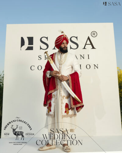 Elegant Off-White Sherwani Complemented by Rich Red Palla