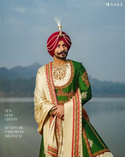 Exquisite Dark Green Sherwani Set with Handcrafted Golden & Red Details